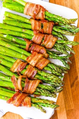 bacon wrapped asparagus on a plate