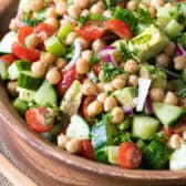 wood bowl filled with chickpea salad