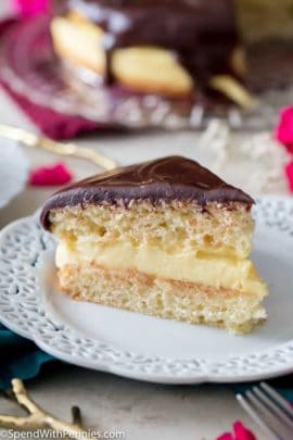Slice of Boston Cream Pie on a white plate
