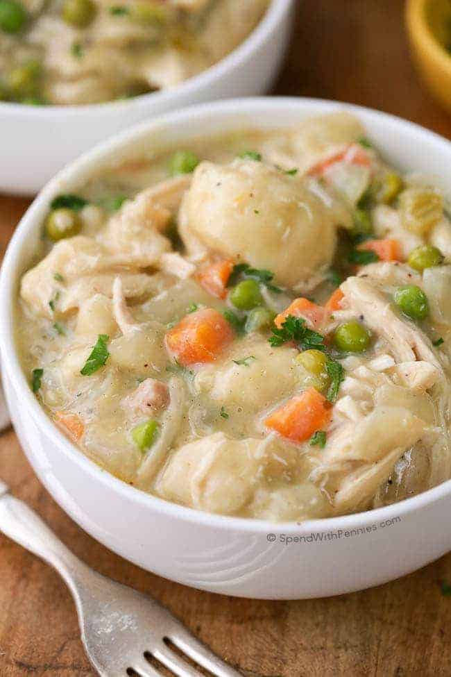 Crock Pot Chicken and Dumplings served in a bowl with parsley on top