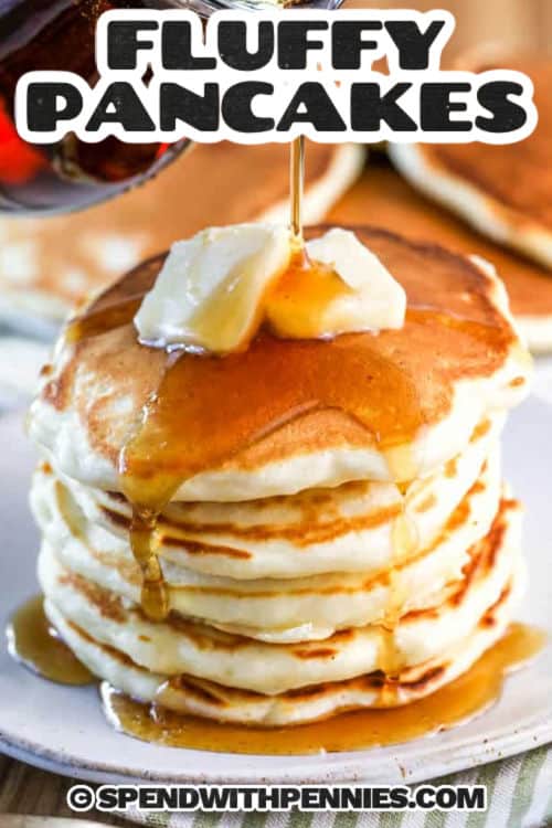plated Fluffy Pancakes with melted butter and writing
