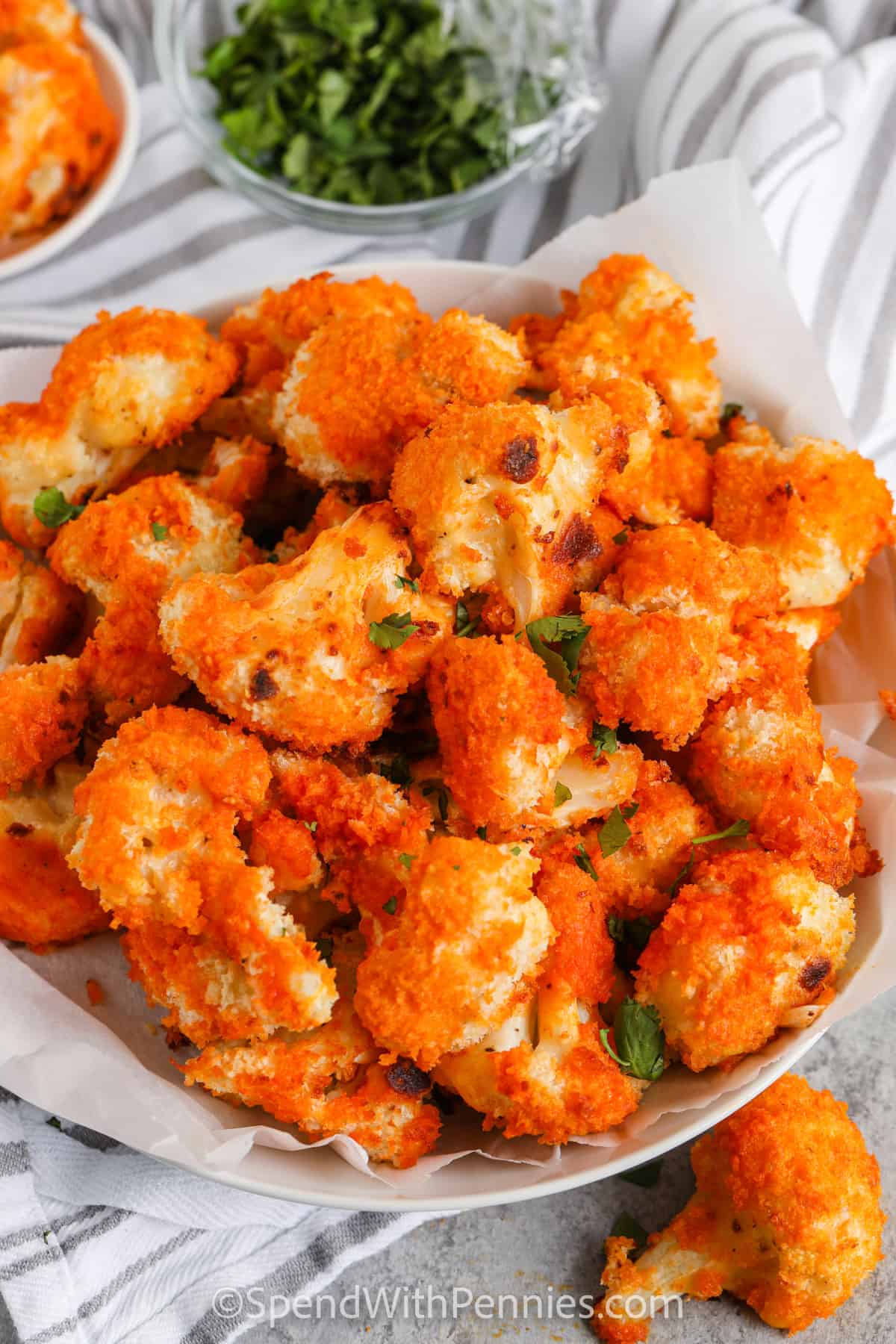 plated Oven Baked Buffalo Cauliflower with garnish
