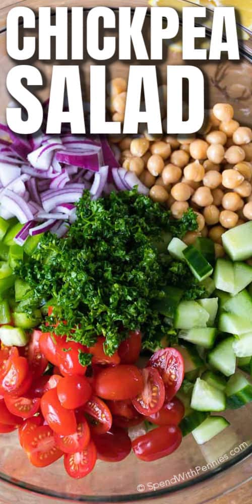 ingredients in a bowl to make Chickpea Salad with a title