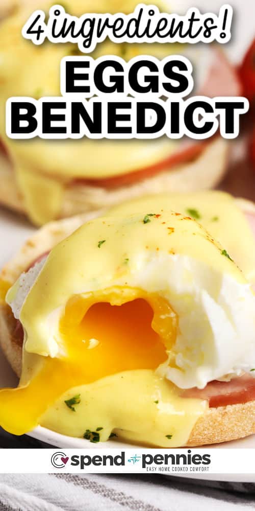 close up of Eggs Benedict on a plate with writing