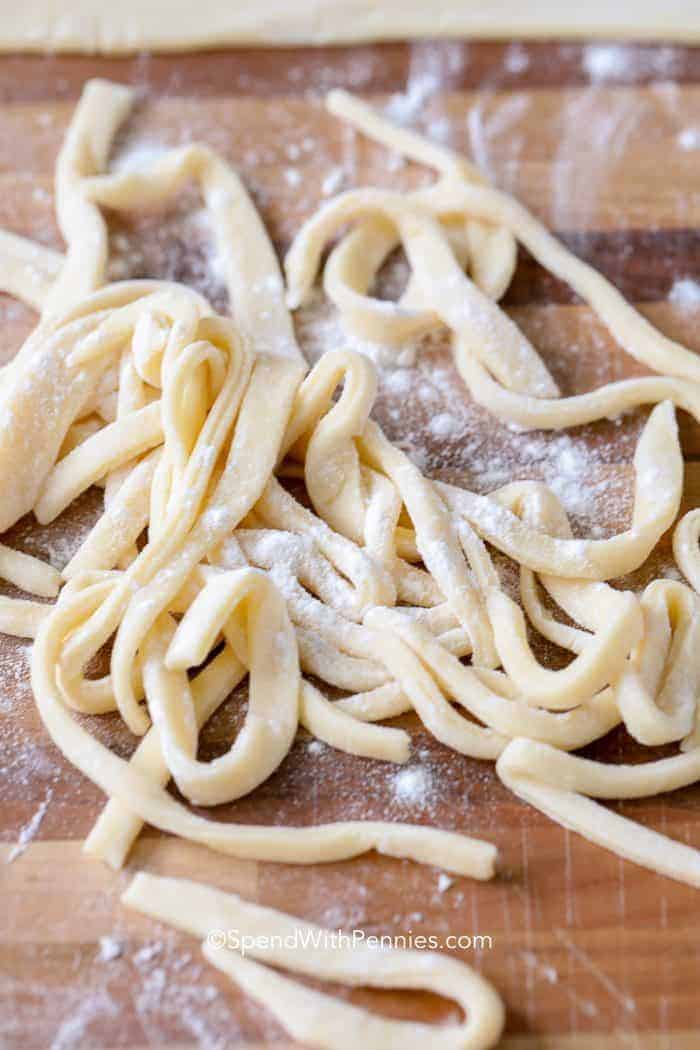 Homemade Egg Noodles on a wooden cutting board