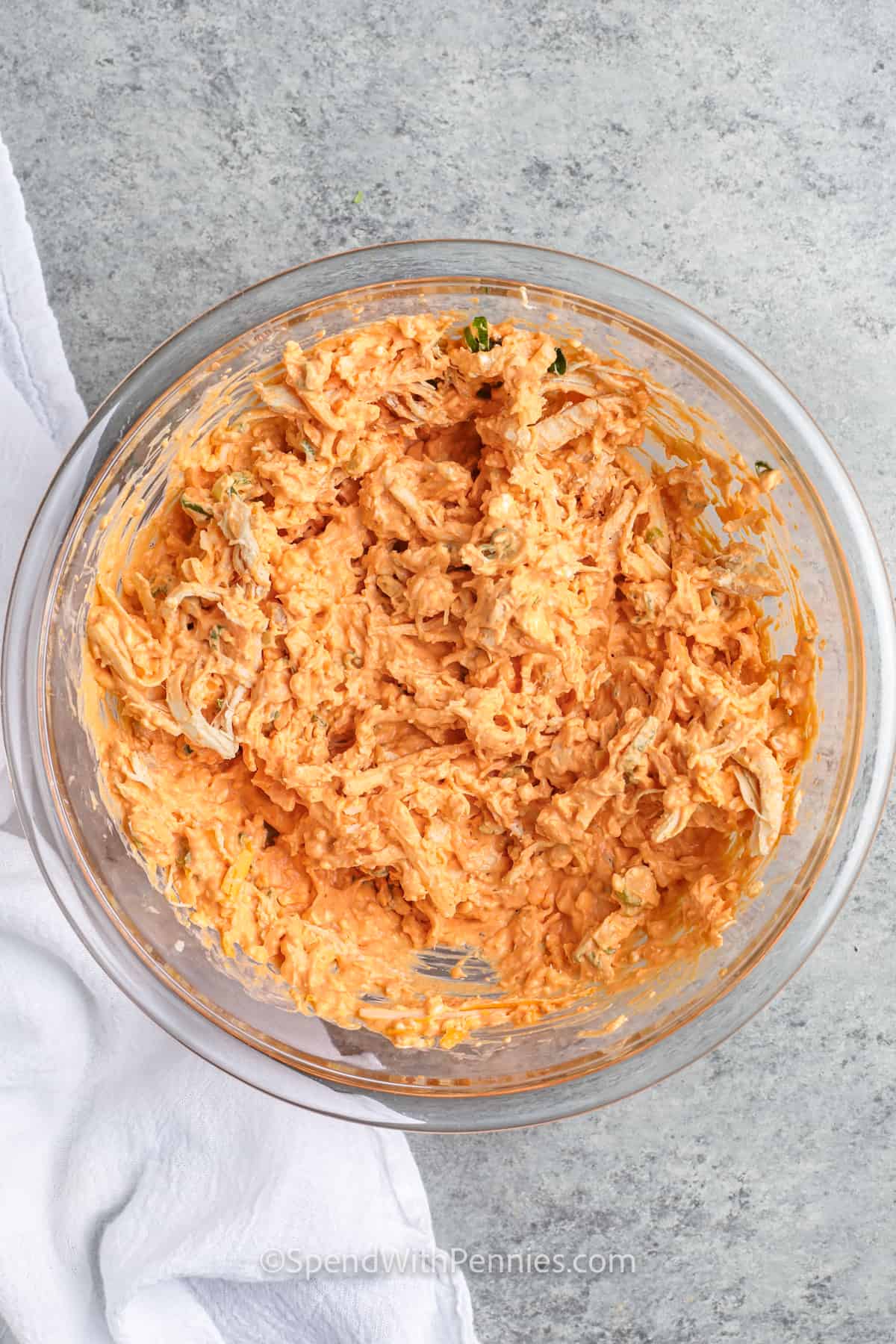 mixed ingredients to make The Best Buffalo Chicken Dip
